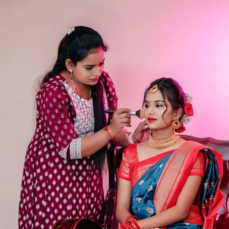 Makeup artist doing a bride's makeup